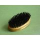 Oval-shaped natural hairbrush with boar bristle